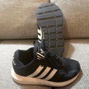 Unisex size 12 Adidas navy blue lace-up sneakers.